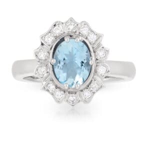 18ct White Gold Oval Aquamarine and Art Deco Diamond Halo Ring