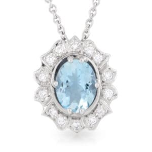 Platinum 1.40ct Aquamarine and 0.21ct Diamond Halo Art Deco Pendant