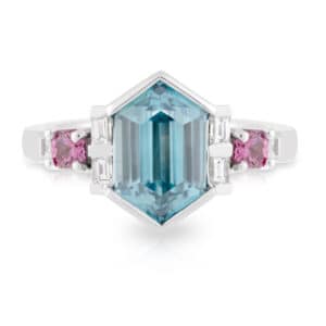 Hexagonal cut Blue Zircon with Pink Spinels and Diamond Ring