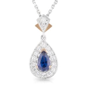 Pear shaped Blue Ceylon Sapphire and Diamond Halo Pendant