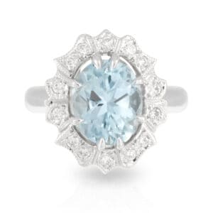 Oval Aquamarine and Art Deco Diamond Halo Ring