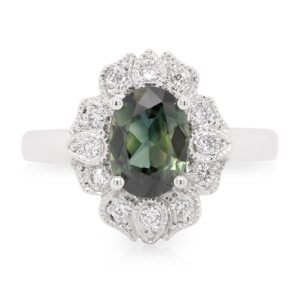 18ct White Gold Cushion Cut 1.14ct Australian Parti Sapphire with Art Deco Diamond Halo. TDW 0.18ct.